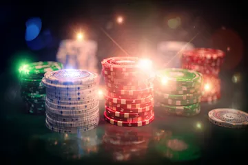 A close-up shot of golden coins falling around a spinning roulette wheel, representing immersive casino action at JL777.